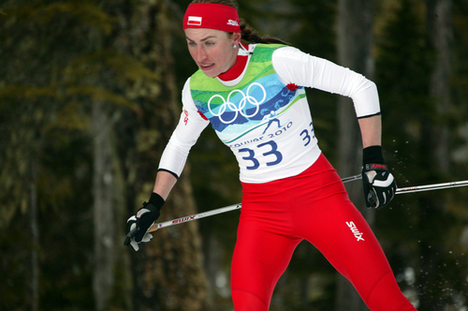 JUSTYNA KOWALCZYK är vårt tips till guld i dagens dubbeljakt för damer i OS i Vancouver. Här från milloppet. JUSTYNA KOWALCZYK var starkast på tremilen och spurtade ned Marit Björgen.