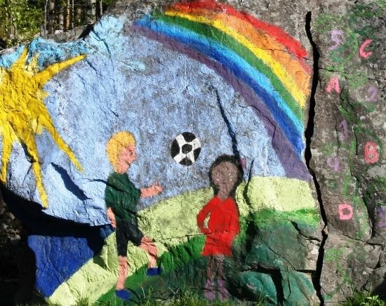 Maleri av barn og regnbue