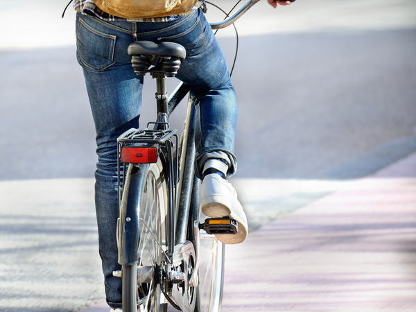 Man on bike on his way home