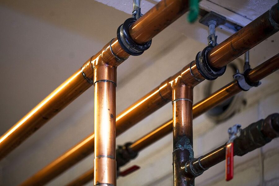 Rør for varmt tappevann i bygninger. Foto: SINTEF