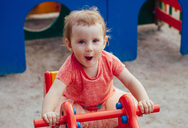 mp15104846-little-girl-on-the-swing-is-happy-laughing