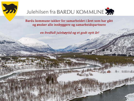 Vinterbilde av Bardu kommune flyfoto med julehilsen til innbyggere og samarbeidspartnere.